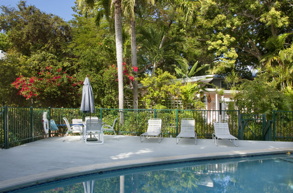 The lushly landscaped grounds and community pool are beautiful.