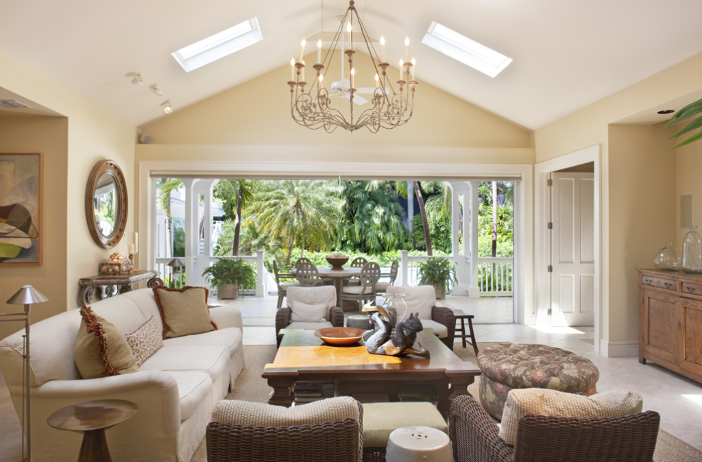 The living room opens to the resort style pool and tropical garden.