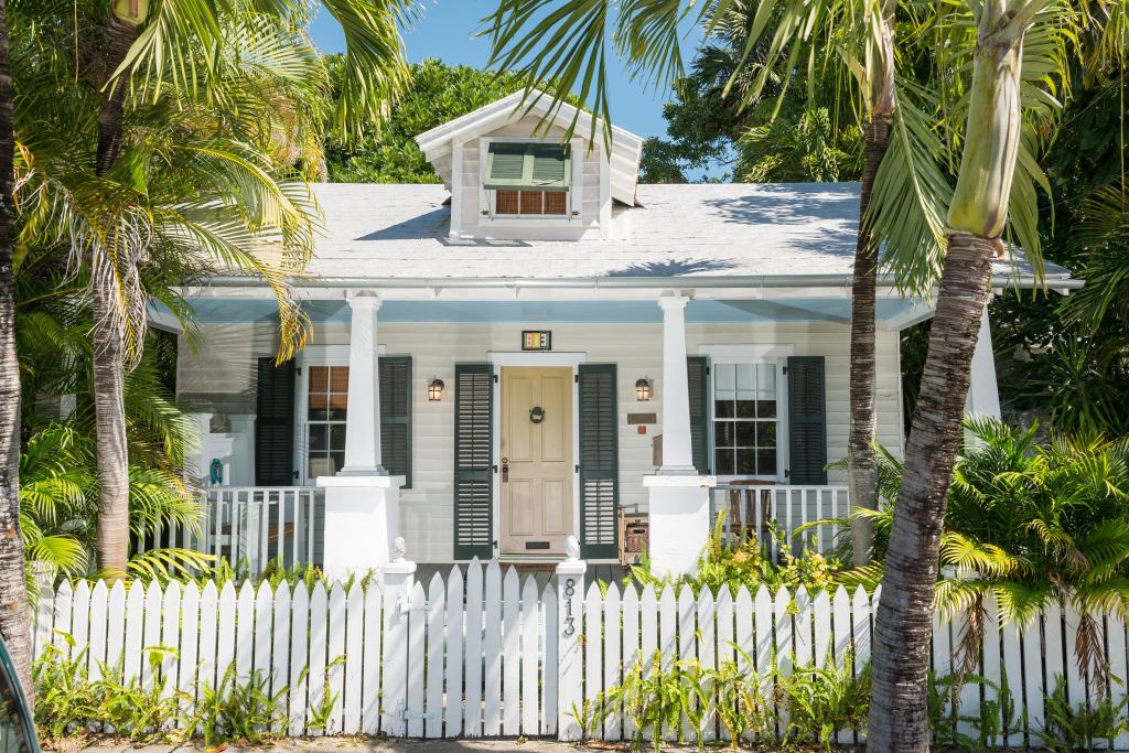 We love 813 Frances Street's classic Key West front porch.
