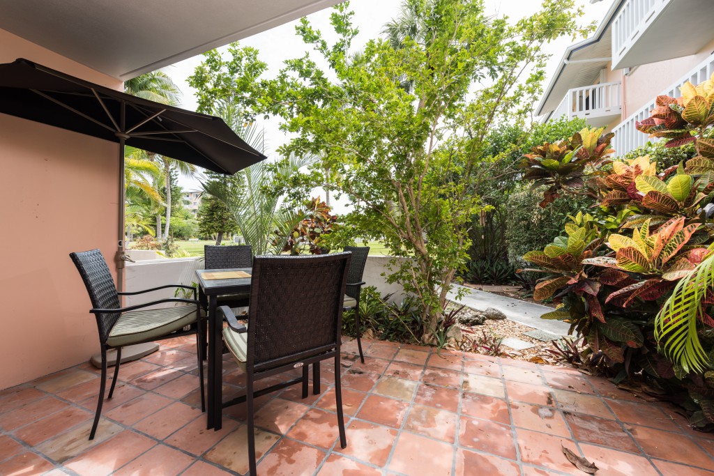The private patio overlooks beautiful tropical gardens.