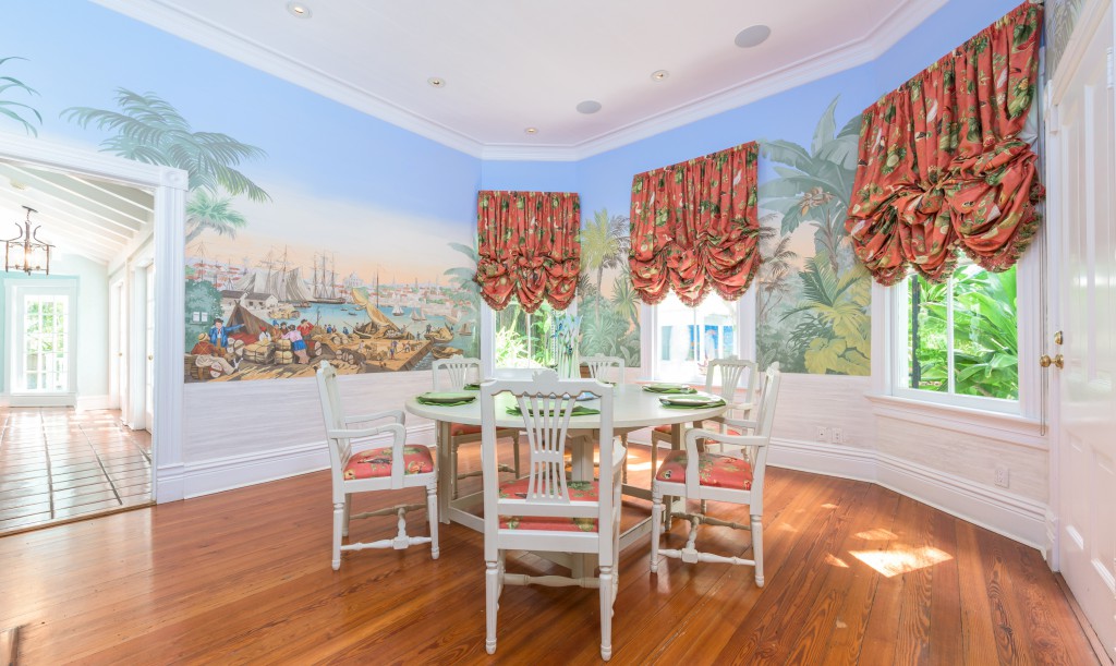 James Alan Smith's murals adorn the walls of the lovely dining room.